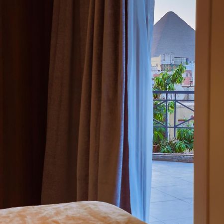 King Khufu Pyramids View Hotel Kafret el-Gabal Camera foto