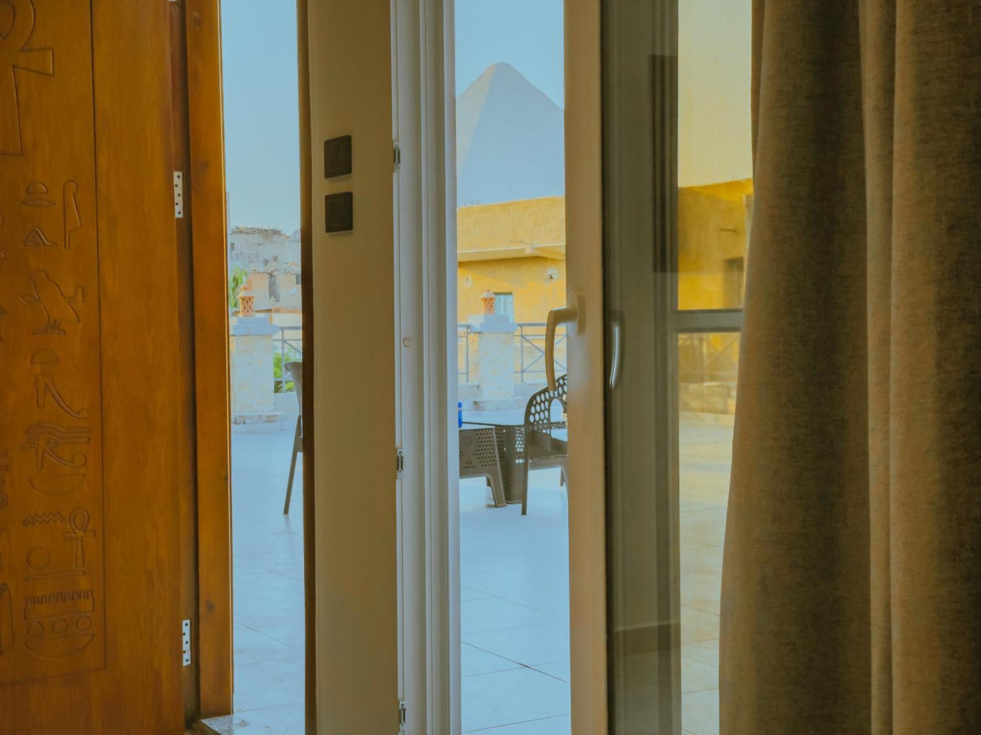 King Khufu Pyramids View Hotel Kafret el-Gabal Camera foto
