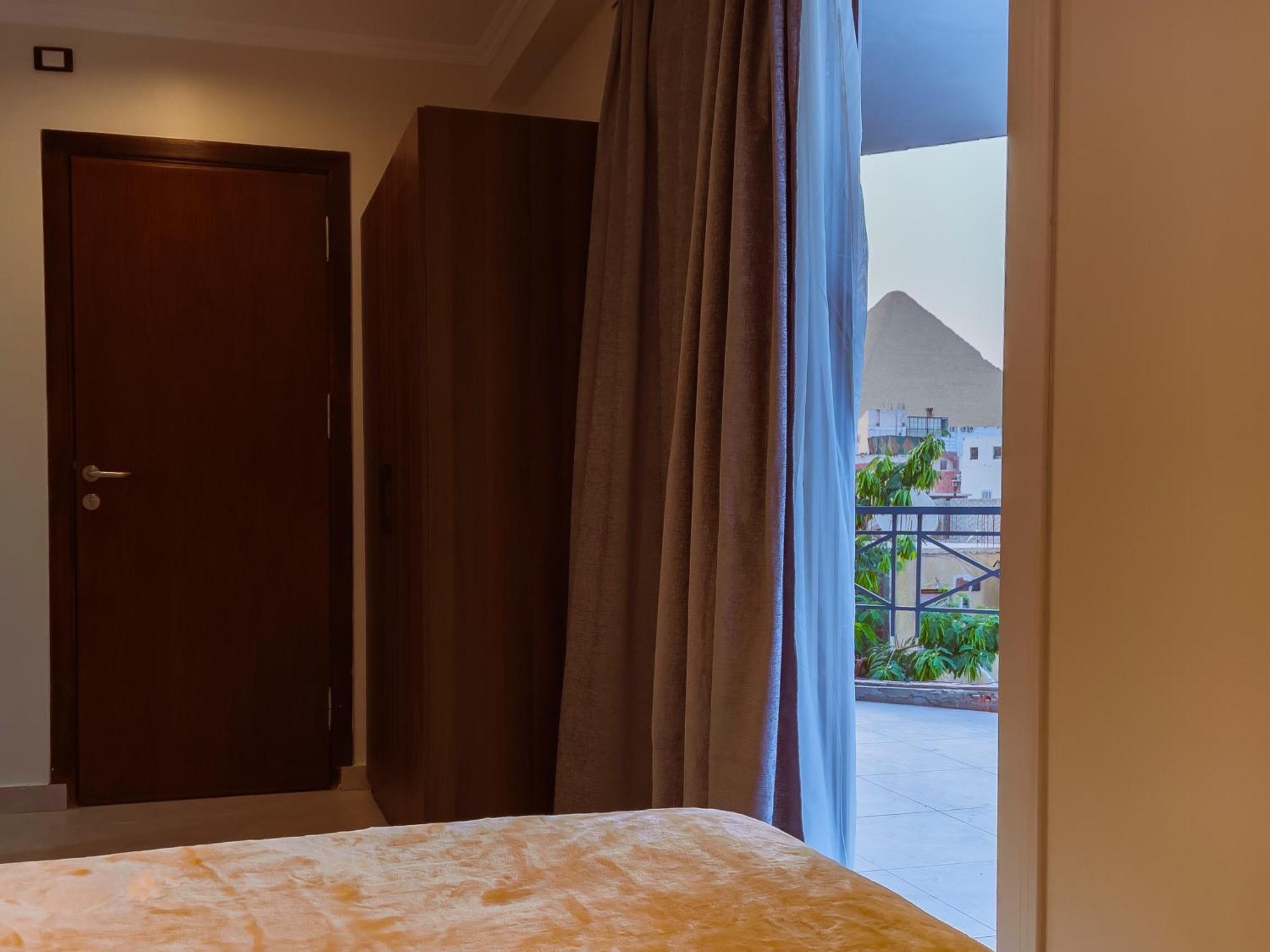 King Khufu Pyramids View Hotel Kafret el-Gabal Camera foto